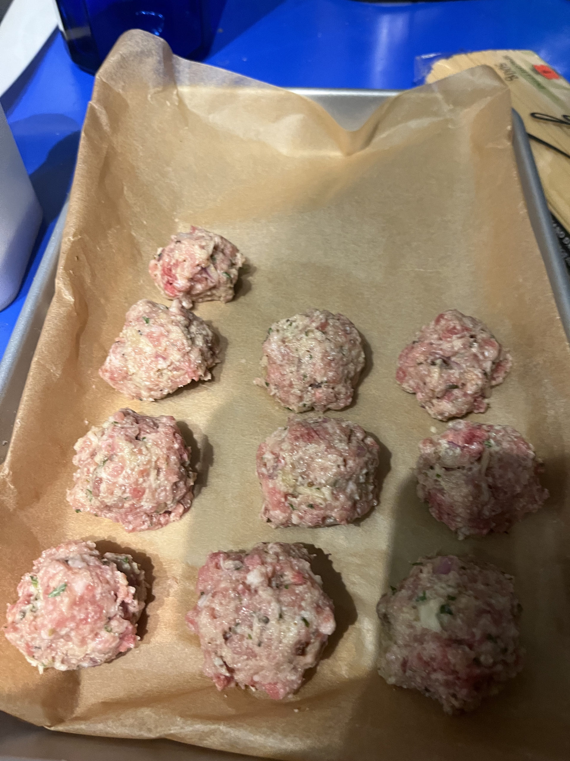 rolled meatballs ready for the oven